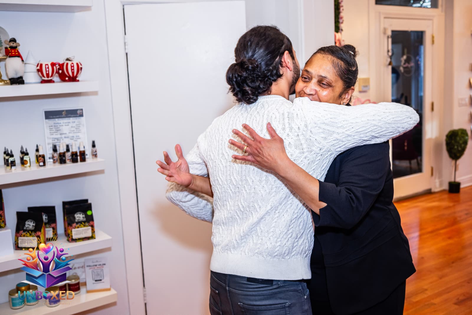 Abdallah embracing a supporter